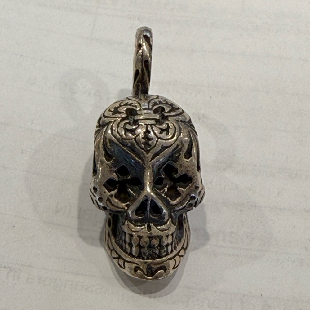 Laughing skull pendant sterling silver